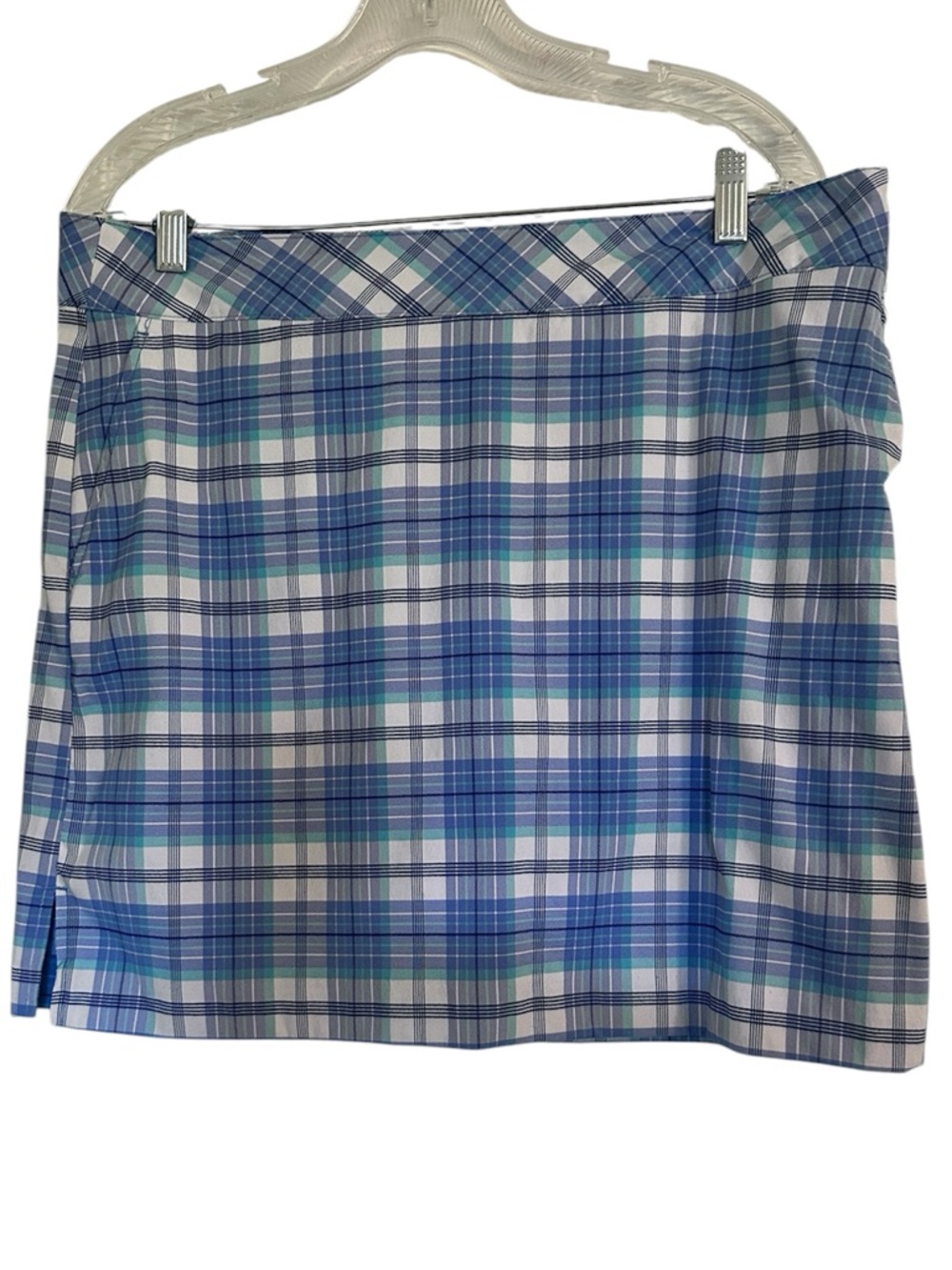 Izod Golf skort in plaid blue print.